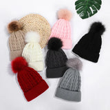 Nukty New Women Personality Wild Female Fur Pom Poms Hats Beanie High Quality Winter Warm Bonnet Outdoor Riding Windproof Knit Cap