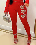 Nukty Two Piece Set Women Outfit Spring Fashion Hollow Heart Rhinestone Mock Neck Long Sleeve Top & Casual High Waist Skinny Pants Set