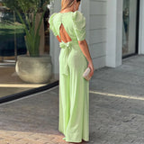 Nukty Casual Elegant Women's Summer Trendy Deep V-Neck Puff Sleeve Hollow Backless High Waist Jumpsuit Sexy Slim Pearl Button Belt