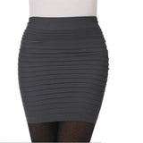 Nukty Fashion Bodycon Skirts Women's Summer Autumn Bottom Elastic Short Skirts For Office Lady Solid Color Draped Slim Mini Skirt