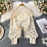 Nukty Bohimian Sweater Women O-neck Lantern Sleeve Tassel Female Causal Crochet Tops Ladies Knitted Hollow Out Sweaters Dropshipping