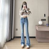 Nukty Fashion New Women Warm Plush Flared Jeans Thermal Fleece Loose Denim Pants Female High Waist Urban Straight Flare Trouser